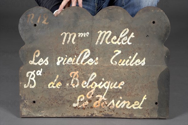 Rateau, Verso d'une plaque de cheminée