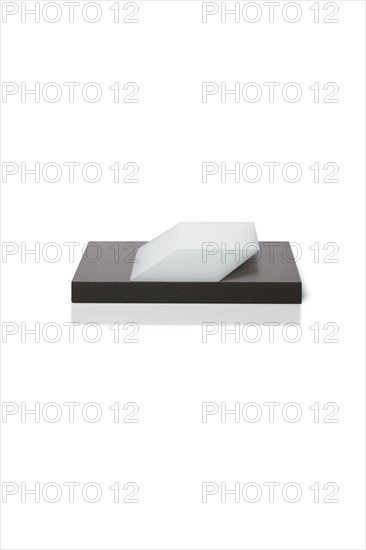 Karel, White Cube with Stone Base