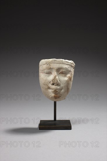 Egyptian sculptor's model figuring the face of a king