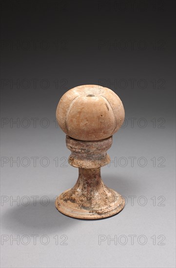 Hellenistic pomegranate on a base