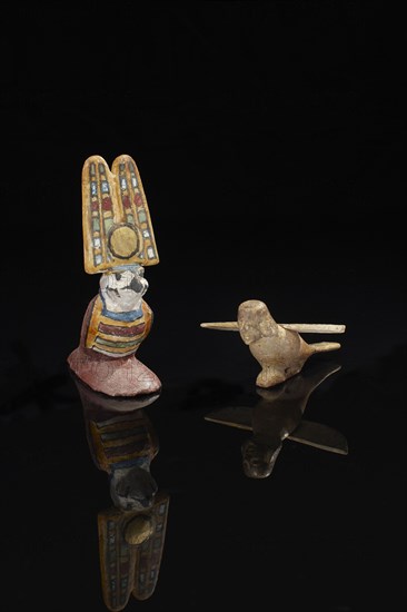 Egyptian polychrome statuette figuring a falcon Akhem and Egyptian gilded  Ba-bird