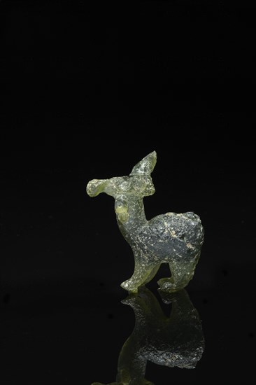Figurine représentant un taureau passant