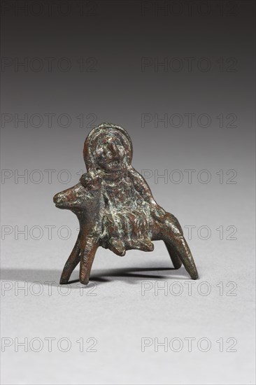 Egyptian statuette figuring probably the Virgin Mary during the flight into Egypt