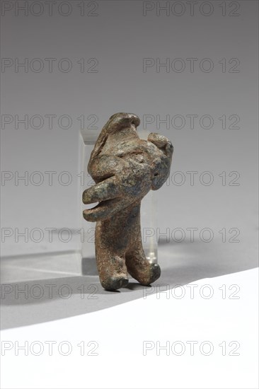 Caucasian figurine of a stylized woman with a child