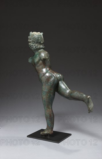 Roman statue figuring Eros Lampidarius