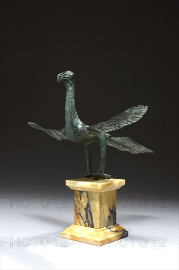 Statuette représentant un oiseau dressé