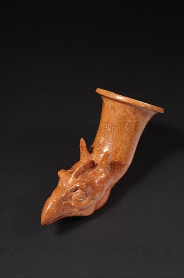 Greek rhyton figuring the head of a griffin