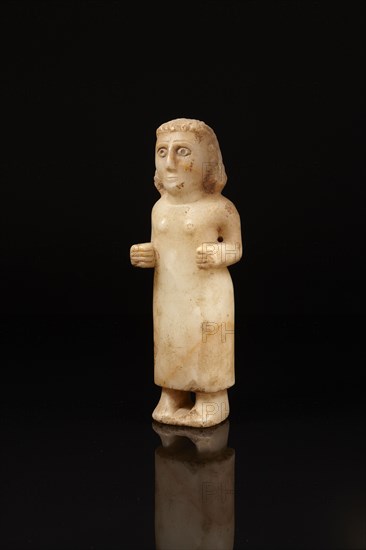 South Arabian statuette of a standing female