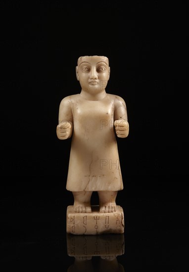 South Arabian statuette of a man inscribed with the name of Abhamid from the clan of Uhayrum