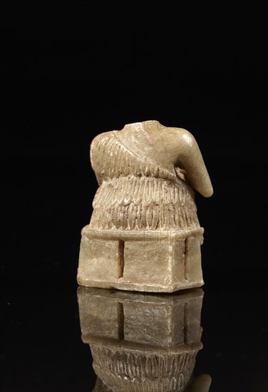 Mesopotamian votive statuette of a seated man