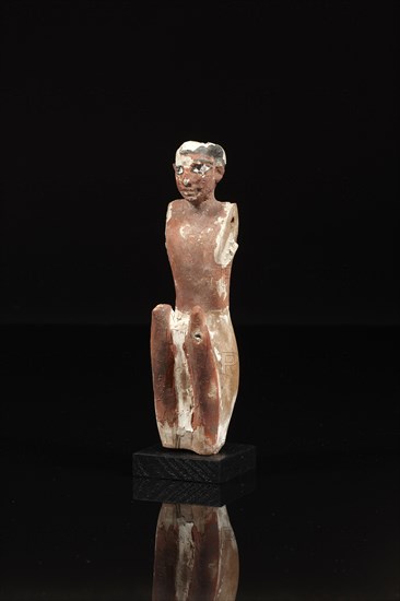 Statuette représentant un homme assis