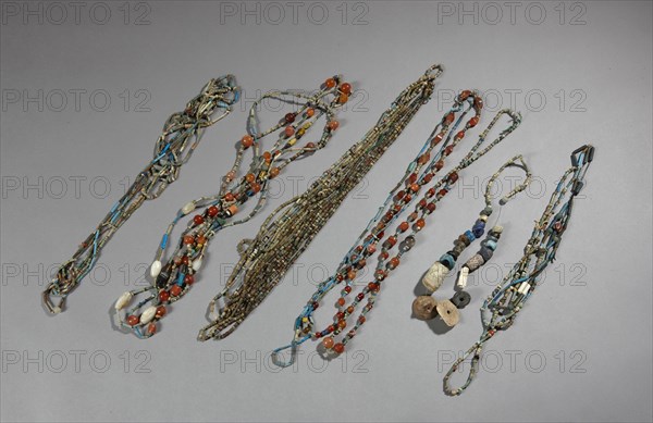 Beads assembled in necklaces