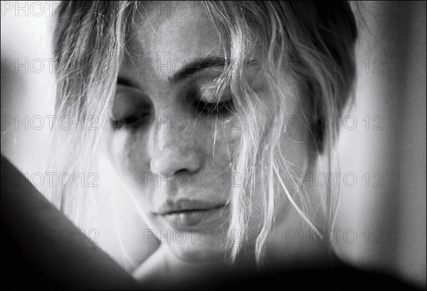 05/00/2004. Paris: Emmanuelle Beart tries gowns before the 57th Cannes film festival.