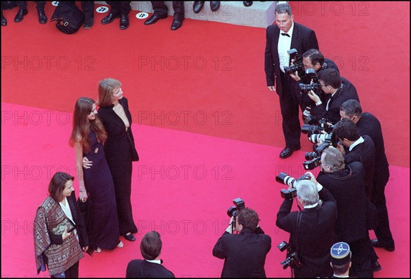 05/09/2001. 54th Cannes Film Festival: Francis Huster walking up the stairs.