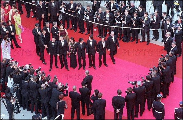 05/09/2001. 54th Cannes Film Festival: Francis Huster walking up the stairs.