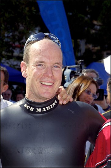 06/17/2001. Prince Albert of Monaco takes part in the first "All Stars Triathlon" in Monaco