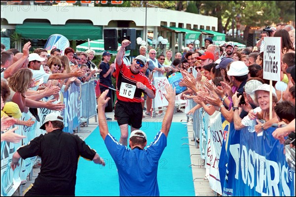 06/17/2001. Prince Albert of Monaco takes part in the first "All Stars Triathlon" in Monaco