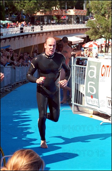 06/17/2001. Prince Albert of Monaco takes part in the first "All Stars Triathlon" in Monaco