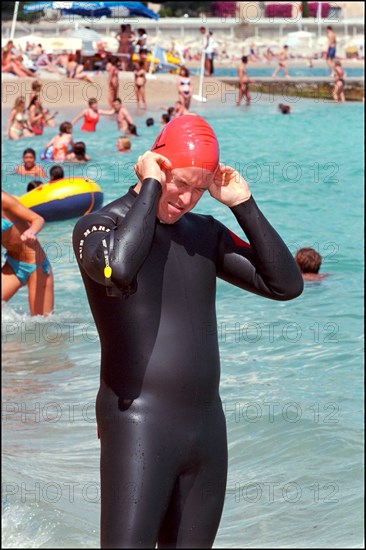 06/17/2001. Prince Albert of Monaco takes part in the first "All Stars Triathlon" in Monaco