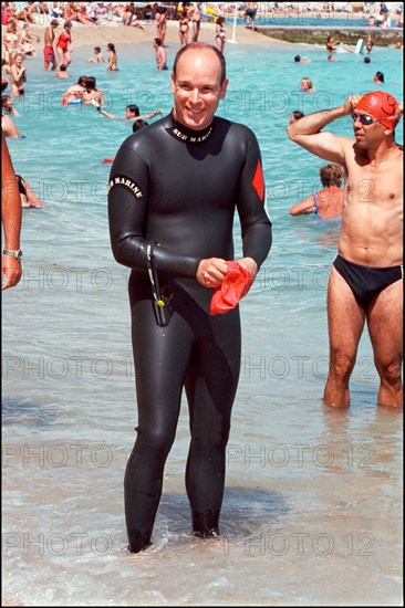 06/17/2001. Prince Albert of Monaco takes part in the first "All Stars Triathlon" in Monaco