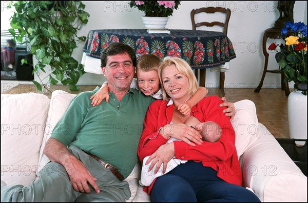 09/00/2001. Close up Muriel Hermine former Synchronized Swimming champion introduces her new born baby Killian