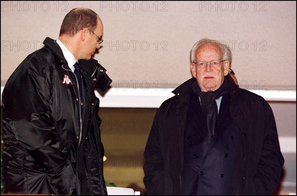 11/16/2001. Prince Rainier and his son Prince Albert of Monaco attend at the French championship soccer game Monaco vs Marseilles.