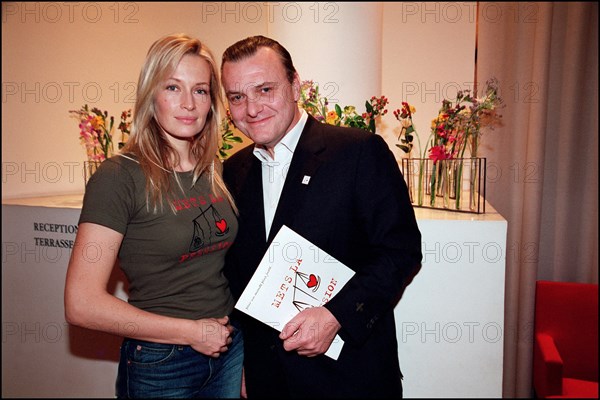 12/20/2001. Model Estelle Lefebure supports "Pour un monde plus juste, mets la pression" (for a fairer world, apply pressure) campaign.