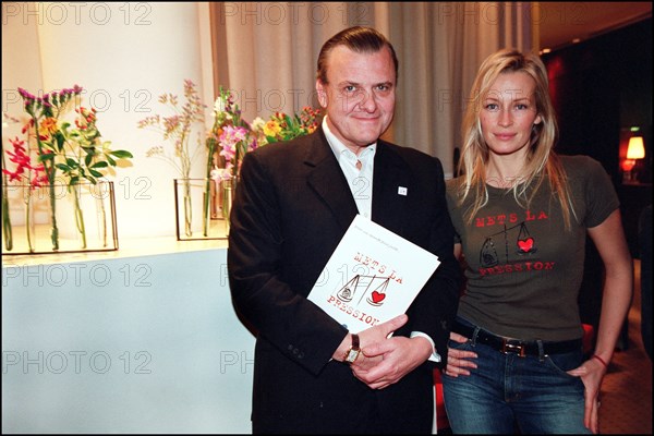 12/20/2001. Model Estelle Lefebure supports "Pour un monde plus juste, mets la pression" (for a fairer world, apply pressure) campaign.