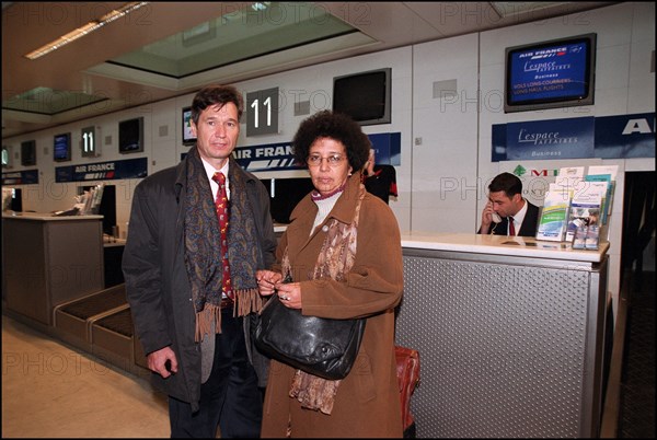 12/27/2001. EXCLUSIVE: Alleged WTC terrorist Zacarias Moussaoui's mother Aicha leaves for Washington with her son's new lawyer François Roux.