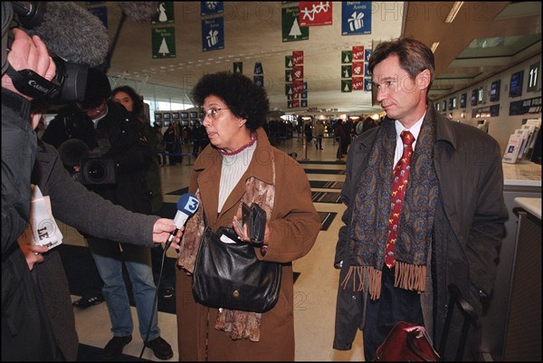 12/27/2001. EXCLUSIVE: Alleged WTC terrorist Zacarias Moussaoui's mother Aicha leaves for Washington with her son's new lawyer François Roux.