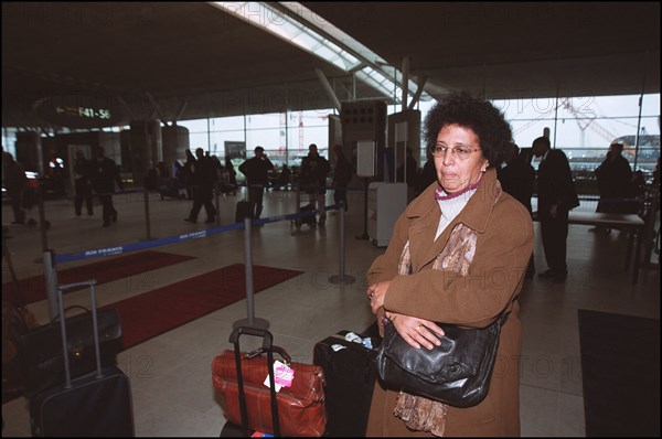 12/27/2001. EXCLUSIVE: Alleged WTC terrorist Zacarias Moussaoui's mother Aicha leaves for Washington with her son's new lawyer François Roux.