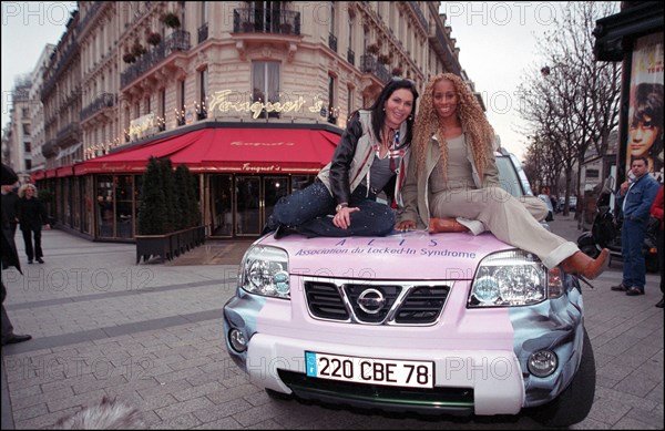 03/16/2002.  Mia Frye, Mouna AL Ayoub and Francois Girbaud present the Nissan car for the "Trophee Aicha des gazelles"