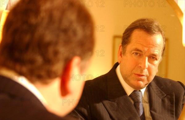 06/14/2002. : Paul-Loup Sulitzer in his hotel room at the Bristol.