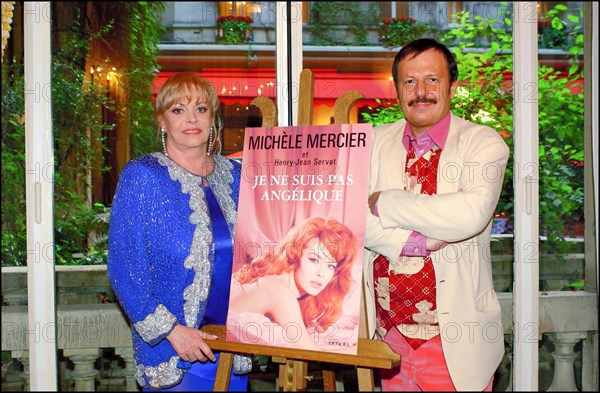 06/27/2002. Michele Mercier presents her book with Henry Jean Servat at the Plaza Athenee.