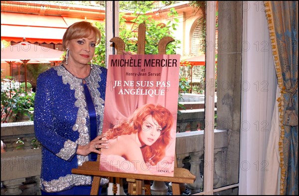 06/27/2002. Michele Mercier presents her book with Henry Jean Servat at the Plaza Athenee.