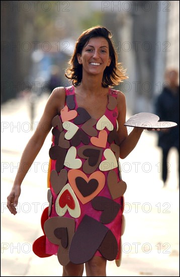 10/28/2002.  Fashion designers dress Severine Ferrer, Laure de Lattre and Mya Frye in chocolate for catwalk appearance at the 8th Salon du Chocolat, Oct. 30.