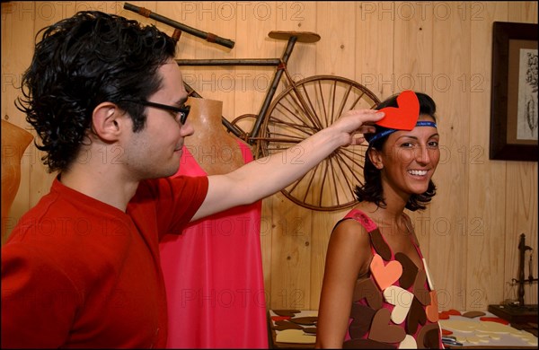 10/28/2002.  Fashion designers dress Severine Ferrer, Laure de Lattre and Mya Frye in chocolate for catwalk appearance at the 8th Salon du Chocolat, Oct. 30.