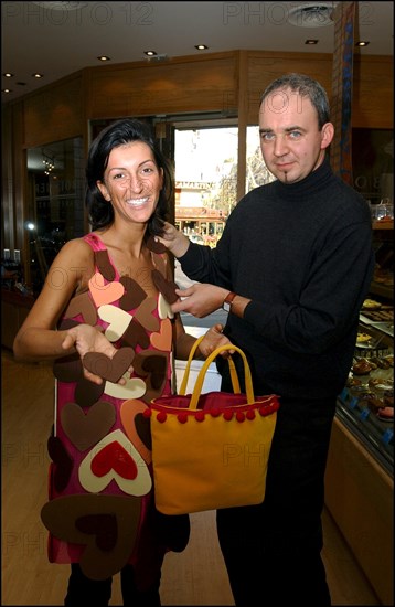 10/28/2002.  Fashion designers dress Severine Ferrer, Laure de Lattre and Mya Frye in chocolate for catwalk appearance at the 8th Salon du Chocolat, Oct. 30.