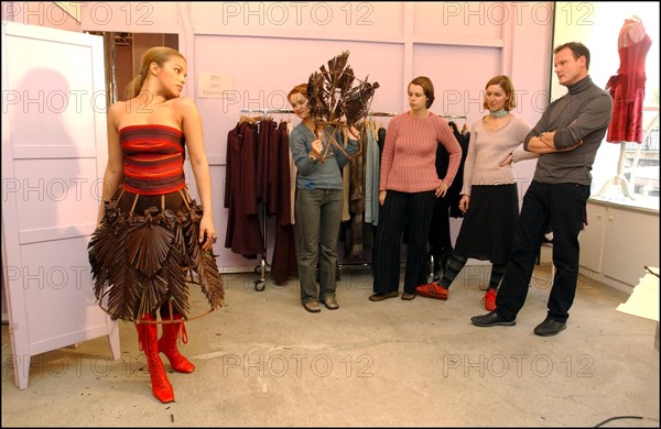 10/28/2002.  Fashion designers dress Severine Ferrer, Laure de Lattre and Mya Frye in chocolate for catwalk appearance at the 8th Salon du Chocolat, Oct. 30.