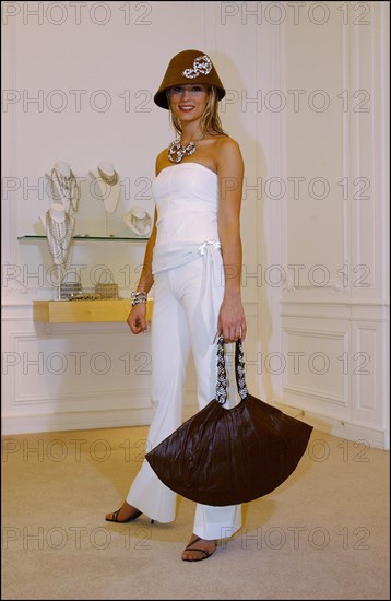 10/29/2002.  Fashion designers dress Loana and Elodie Gossuin in chocolate for catwalk appearance at the 8th Salon du chocolat, Oct 30.