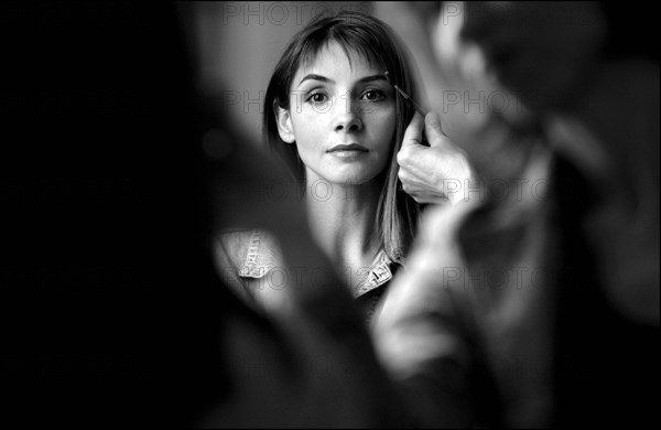 05/00/2003. Clotilde Courau tries gowns on at Valentino's before the 56th Cannes Film