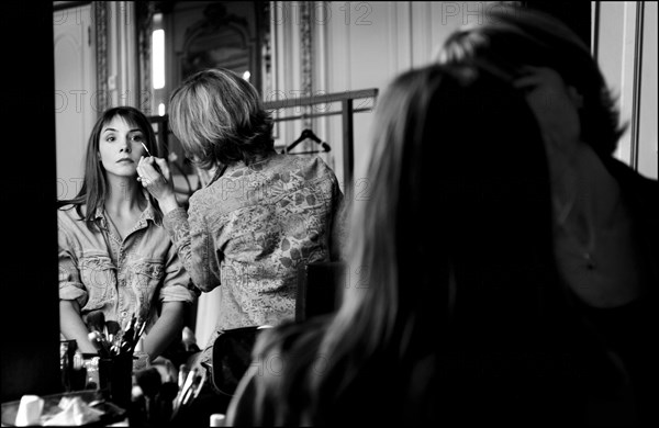 05/00/2003. Clotilde Courau tries gowns on at Valentino's before the 56th Cannes Film