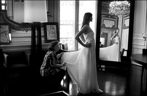 05/00/2003. EXCLUSIVE Clotilde Courau tries gowns on at Valentino's before the 56th Cannes Film