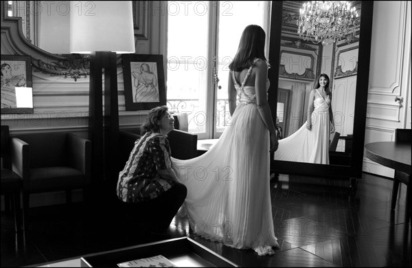 05/00/2003. EXCLUSIVE Clotilde Courau tries gowns on at Valentino's before the 56th Cannes Film