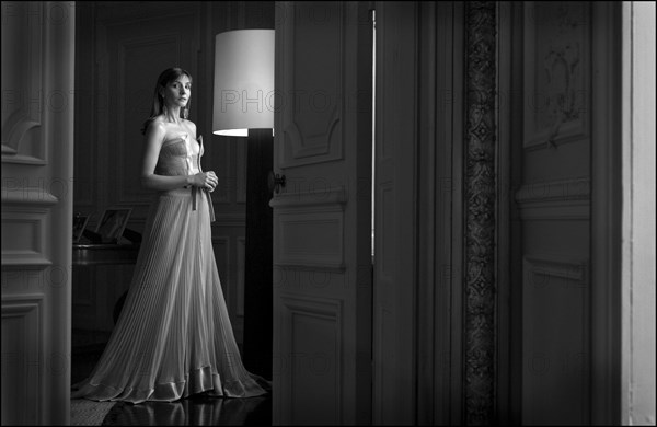 05/00/2003. Clotilde Courau tries gowns on at Valentino's before the 56th Cannes Film