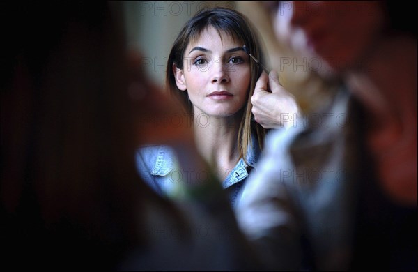 05/00/2003. Clotilde Courau tries gowns on at Valentino's before the 56th Cannes Film