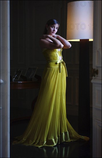 05/00/2003. EXCLUSIVE Clotilde Courau tries gowns on at Valentino's before the 56th Cannes Film