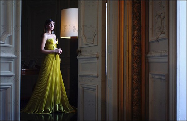 05/00/2003. EXCLUSIVE Clotilde Courau tries gowns on at Valentino's before the 56th Cannes Film