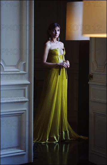 05/00/2003. EXCLUSIVE Clotilde Courau tries gowns on at Valentino's before the 56th Cannes Film