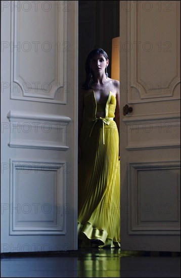 05/00/2003. Clotilde Courau tries gowns on at Valentino's before the 56th Cannes Film